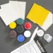 a group of different colored paints