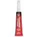 a red and white tube of lipstick