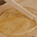 a spoon in a bowl of food